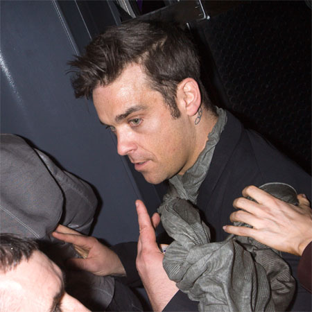 Robbie Williams' love warning