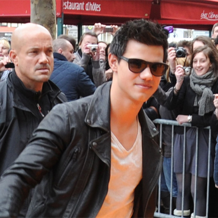 Taylor Lautner happy to date fan