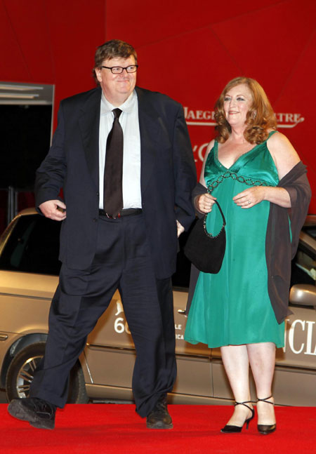 U.S. director Moore and his wife on the red carpet at the 66th Venice Film Festival