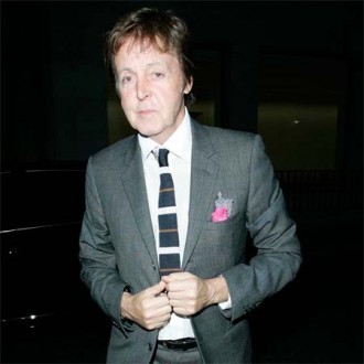 Devoted dad Paul McCartney