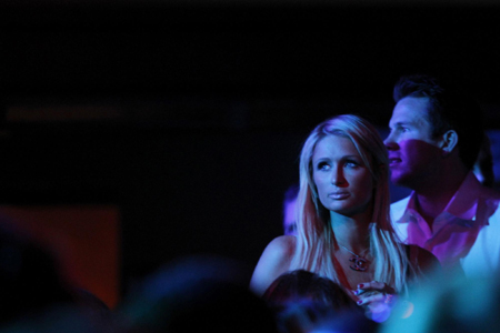 Paris Hilton and Doug Reinhardt watch performance