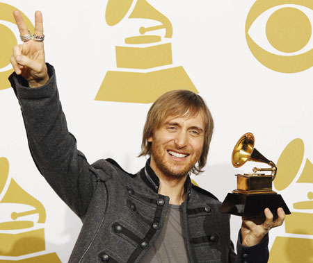 David Guetta holds his Grammy award for best remixed recording at 52nd annual Grammy Awards