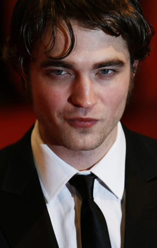 Robert Pattinson drops signature hairdo