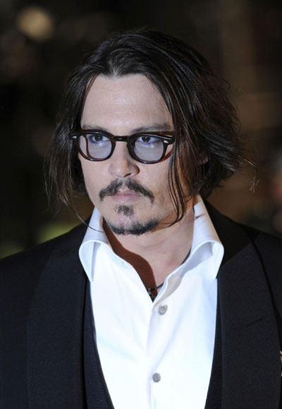 Hathaway, Johnny Depp attend Royal World Premiere of 