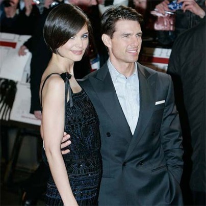 Katie Holmes sings to Tom