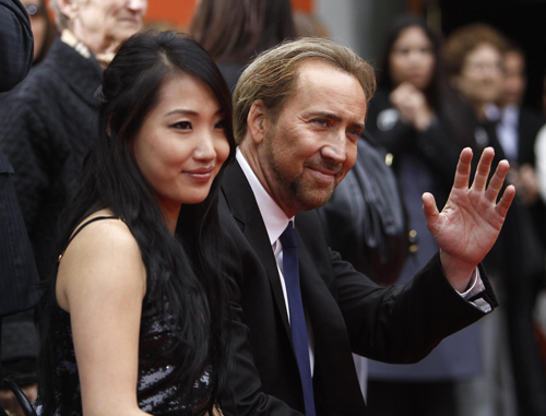 Actors Nicolas Cage and Tom Cruise attend hand and footprints ceremony for producer Jerry Bruckheimer