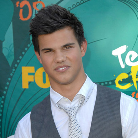 Taylor Lautner happy at home