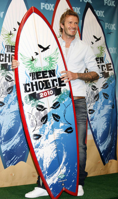 David Beckham poses in the press room at the Teen Choice 2010 Awards