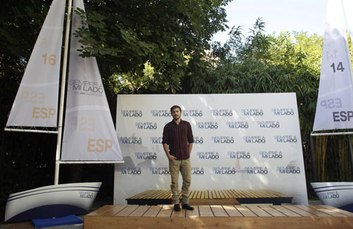 Zac Efron poses during a photocall to promote the film 'Charlie St. Cloud'