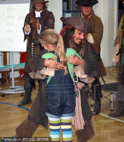 Johnny Depp makes surprise school visit in pirate gear