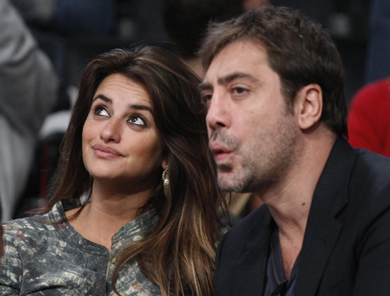 Penelope Cruz and Javier Bardem attend the NBA basketball game