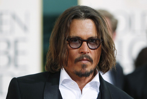 Johnny Depp arrives at the 68th annual Golden Globes Awards