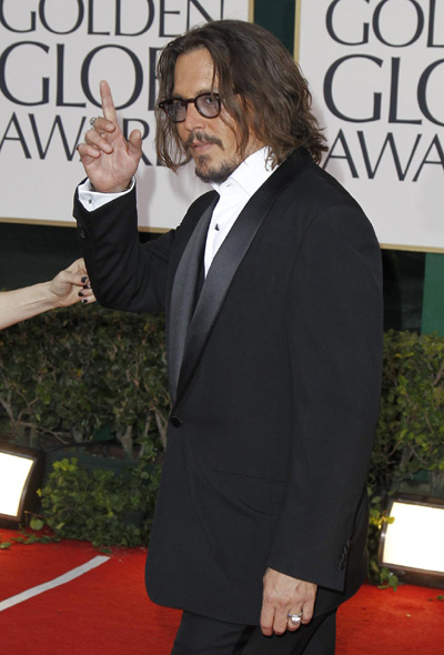 Johnny Depp arrives at the 68th annual Golden Globes Awards