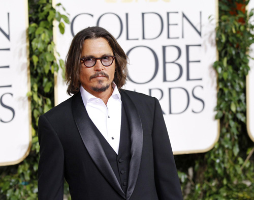 Johnny Depp arrives at the 68th annual Golden Globes Awards