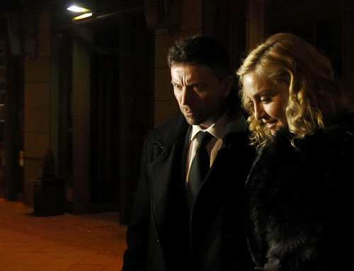 Madonna leaves a restaurant at Berlin's Gendarmenmarkt square