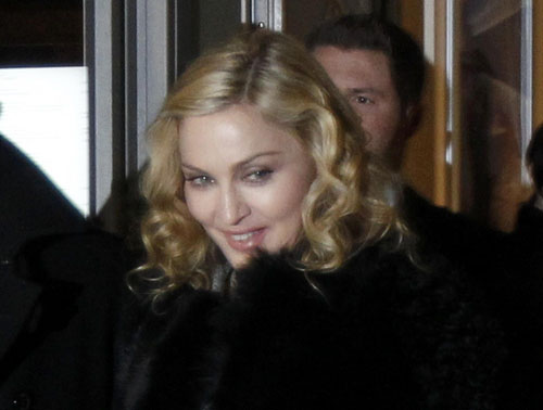 Madonna leaves a restaurant at Berlin's Gendarmenmarkt square