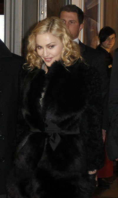 Madonna leaves a restaurant at Berlin's Gendarmenmarkt square