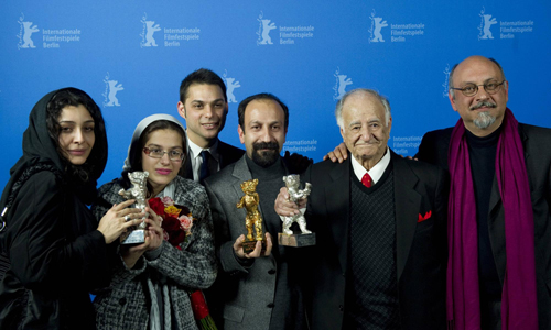 Members of the film 'Jodaeiye Nadar Az Simin'receive the Golden Bear aword for best film