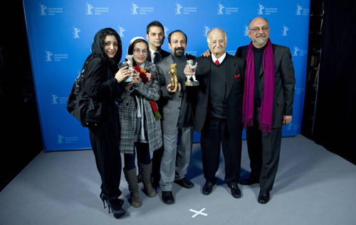 Members of the film 'Jodaeiye Nadar Az Simin'receive the Golden Bear aword for best film