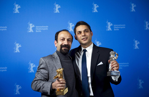 Members of the film 'Jodaeiye Nadar Az Simin'receive the Golden Bear aword for best film