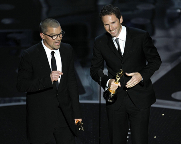 Angus Wall and Kirk Baxter win the Oscar for best film editing