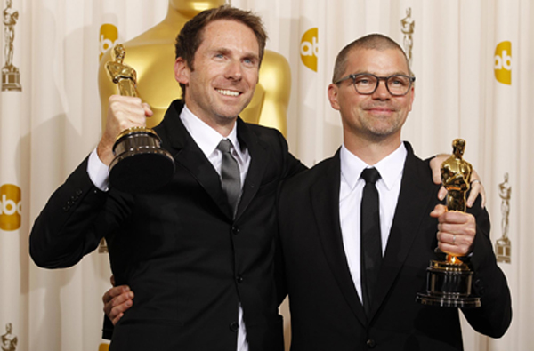 Angus Wall and Kirk Baxter win the Oscar for best film editing