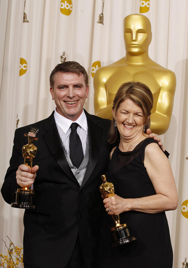 Robert Stromberg and Karen O'Hara win the Oscar for Art Direction