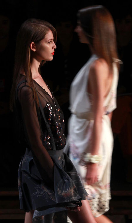 Models present creations from the Teca collection during Fashion Rio Summer 2012