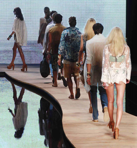 Models present creations from the Teca collection during Fashion Rio Summer 2012