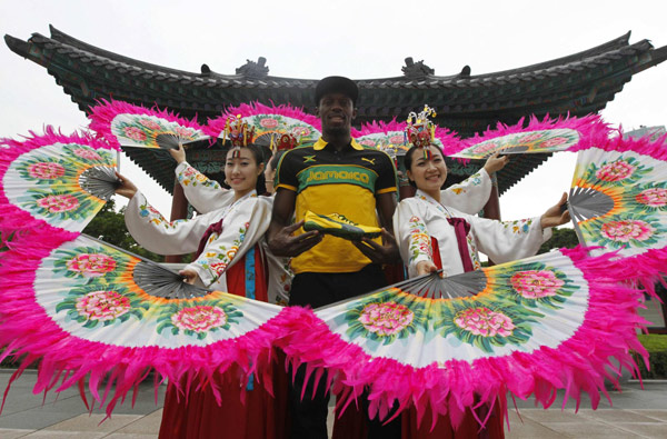 Jamaica poses wearing traditional Hanbok in Daegu