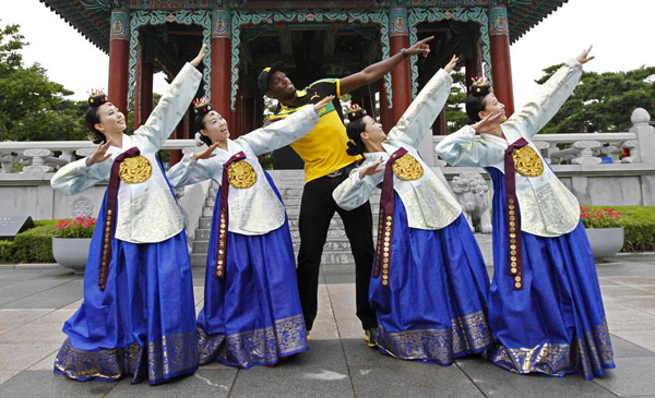 Jamaica poses wearing traditional Hanbok in Daegu