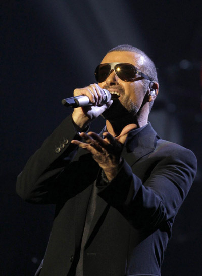 George Michael performs during his concert in Prague