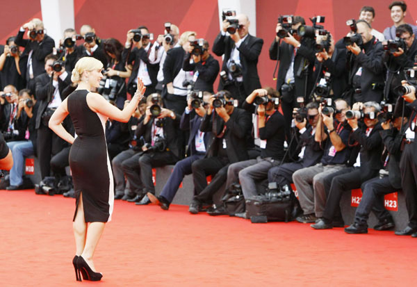 Actress Winslet poses during 68th Venice Film Festival