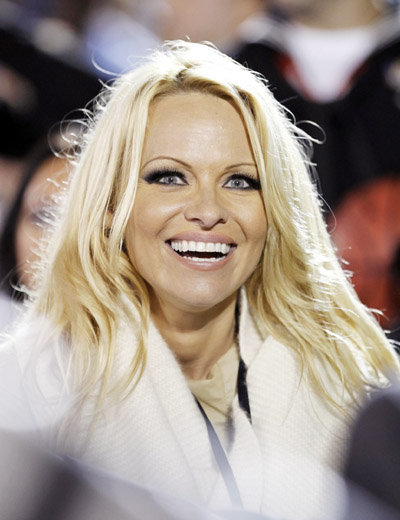 Pamela Anderson cheers for NCAA