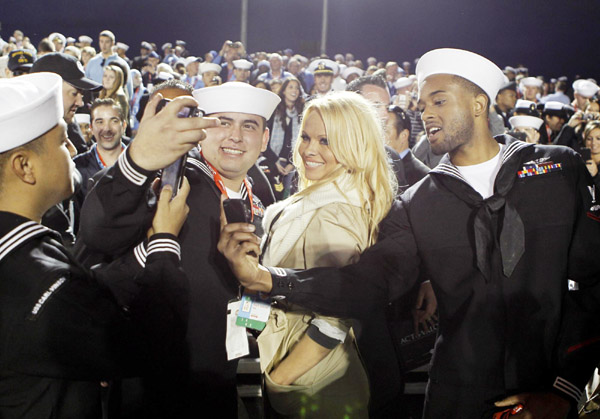 Pamela Anderson cheers for NCAA