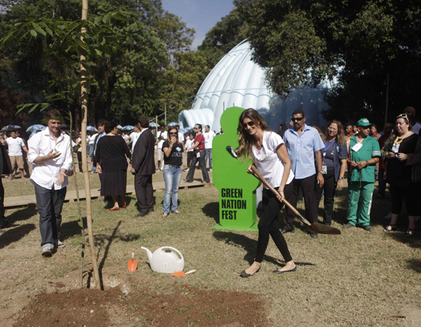 Gisele Bundchen plants trees