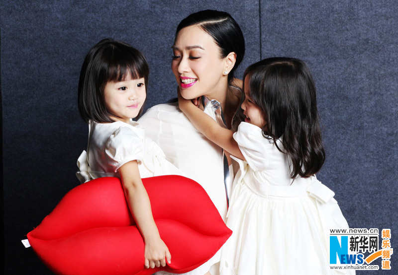 Christy Cheung and daughters pose for magazine