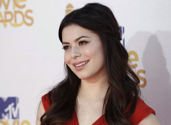 Miranda Cosgrove attends the 2010 MTV Movie Awards