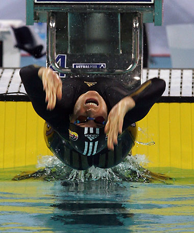 Janine Pietsch of Germany swims to win the women's 50 metres backstroke at the 8th FINA World Short Course Swimming Championships 