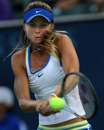 Daniela Hantuchova of Slovakia hits a shot to Serena Williams of the U.S. during the JPMorgan Chase Open women's tennis tournament in Carson, California, August 10, 2006. 