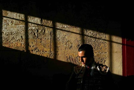 Bullfighter Jose Manuel Sandin waits before a bullfight in the Maestranza bullring in Seville August 27, 2006. 