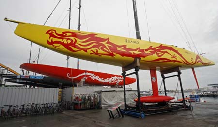 America's Cup challenger China Team boat CHN95 (front) is displayed during its unveiling ceremony two days before the Valencia Louis Vuitton Act 13 Fleet-Race competition in Valencia April 1, 2007. 