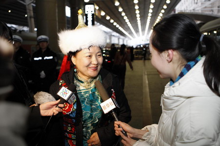 Members of CPPCC arrive in Beijing for session 