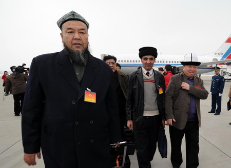 Members of CPPCC arrive in Beijing for session 