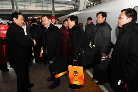 Members of CPPCC arrive in Beijing for session 