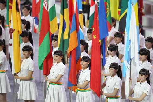 Flags of participants show up at Expo opening