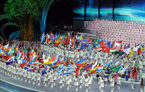 Flags of participants show up at Expo opening