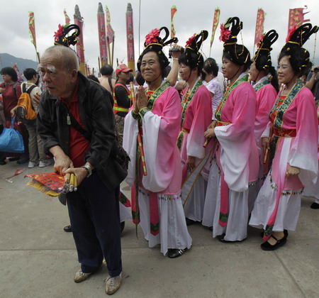 People celebrate Tin Hau festival in Hong Kong