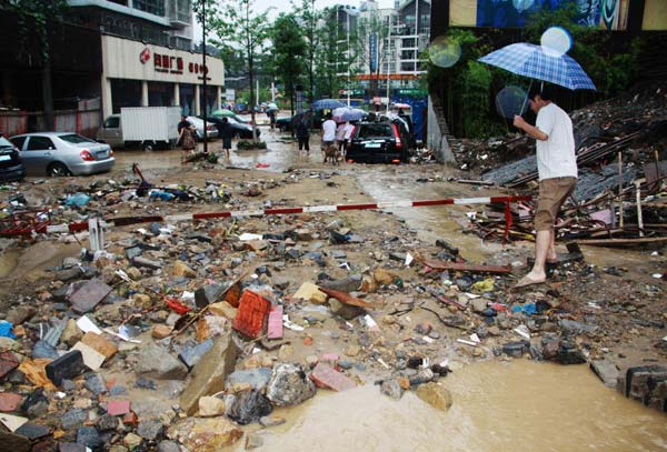 Floods leave 13 dead, 23 missing in SW China