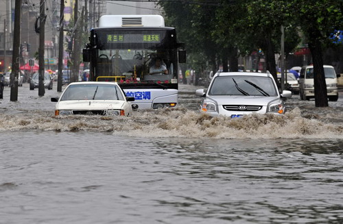 Floods overwhelm streets in NE China